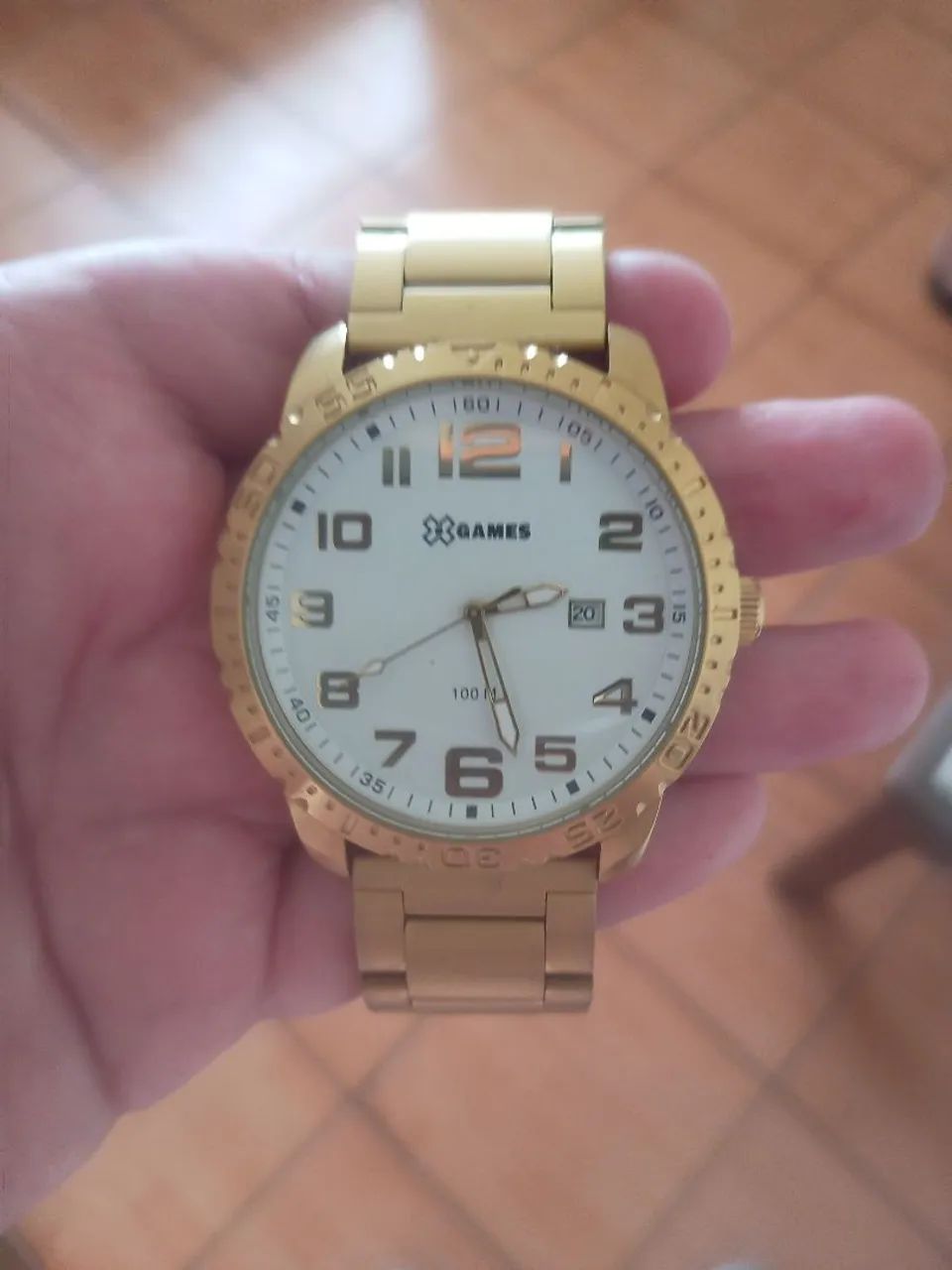 Relógio Marca Xgames, dourado, com fundo branco, novo. - Foto 5