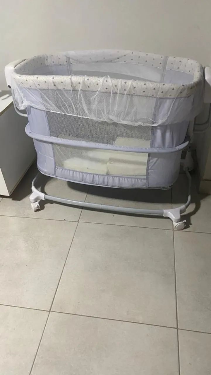 Berço  balanço ajustável. 