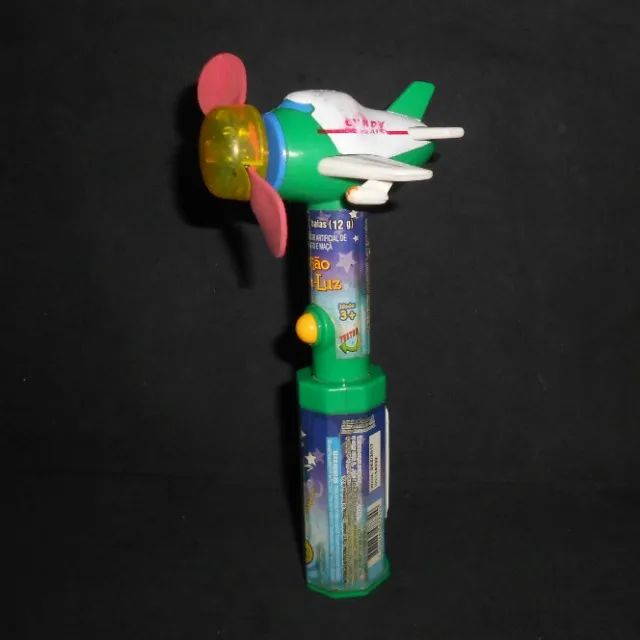 Avião Gira-Luz - brinquedo antigo de avião que vinha com doce - não funciona