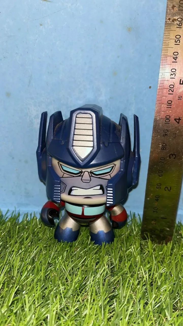 Boneco Transformers Mighty Muggs Optimus Prime Hasbro