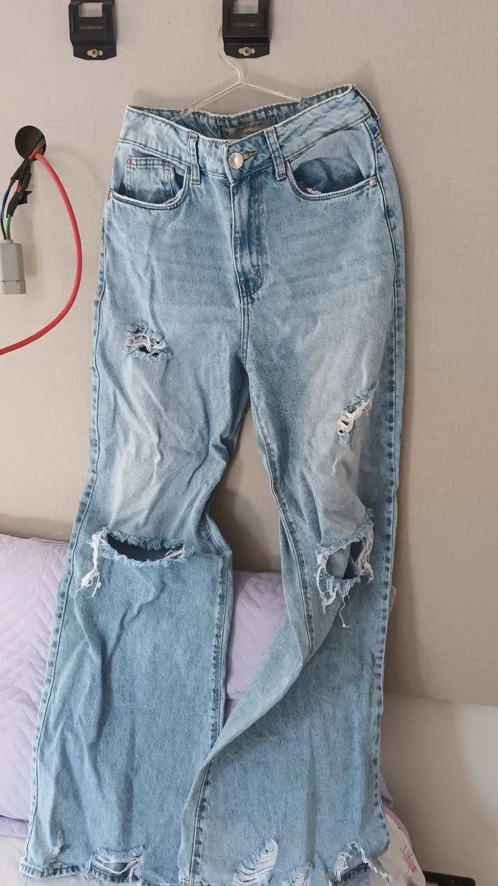 Calça feminina rasgada jeans tamanho 36 - Foto 2
