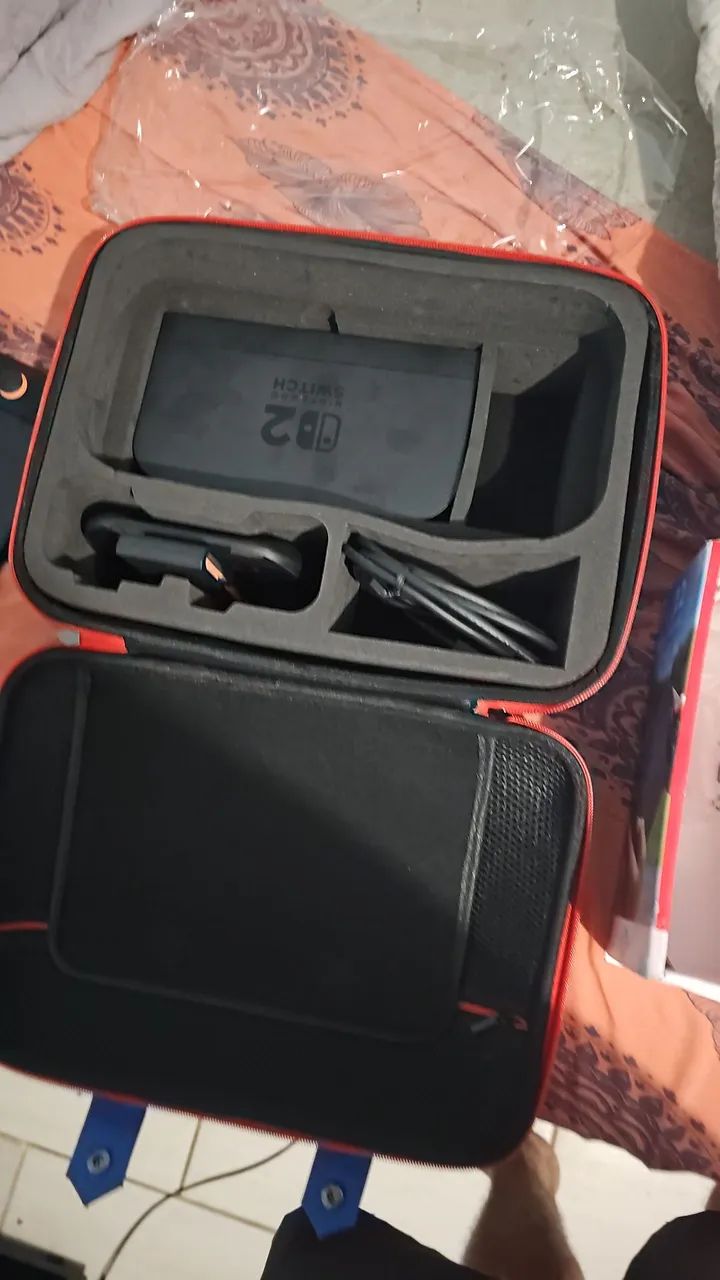 Nintendo switch 2 com caixa + maleta e case + 3 jogos - Foto 4