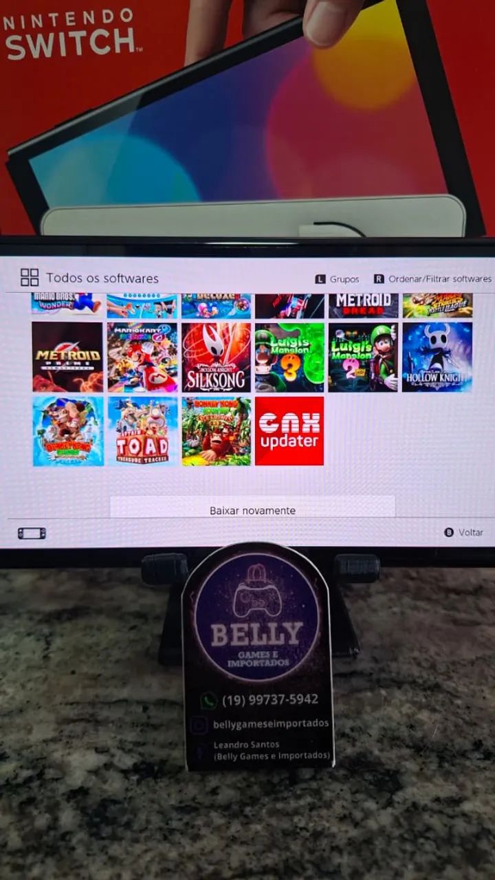 NINTENDO SWITCH OLED BRANCO DESBLOQUEADO NA CAIXA COM 21 JOGOS - Foto 3