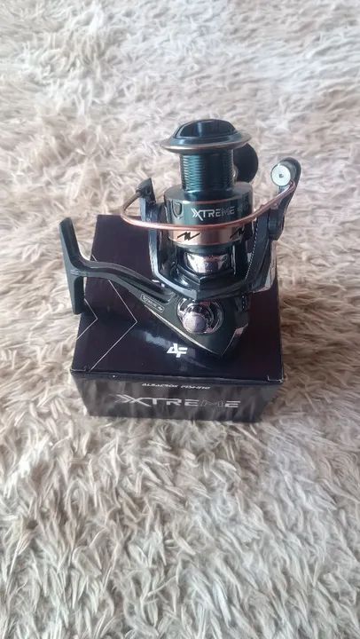 Molinete 4000 para vara de pesca  - Foto 4