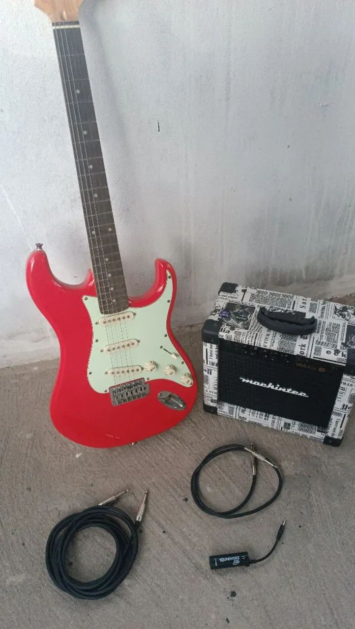 Guitarra, amplificador e cabos