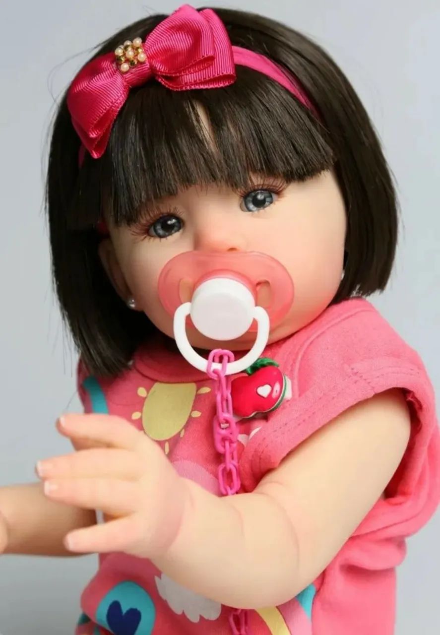 Boneca bebê reborn toda de silicone com cabelo 49 cm - Foto 2