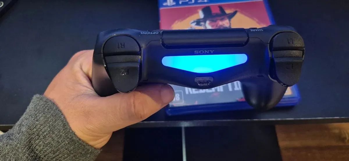 Sony Playstation 4 na Caixa Original com 500gb preto + controle + 11 jogos físicos - Foto 4