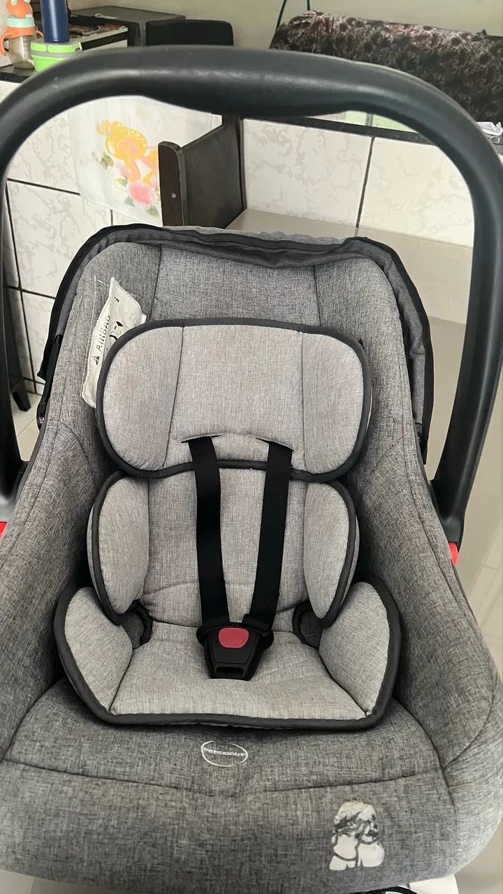 Bebê conforto negociável 