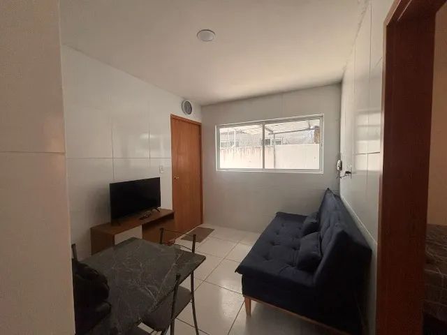 Lindo apto térreo com Área Privativa próximo a Praia, com 2 quartos.