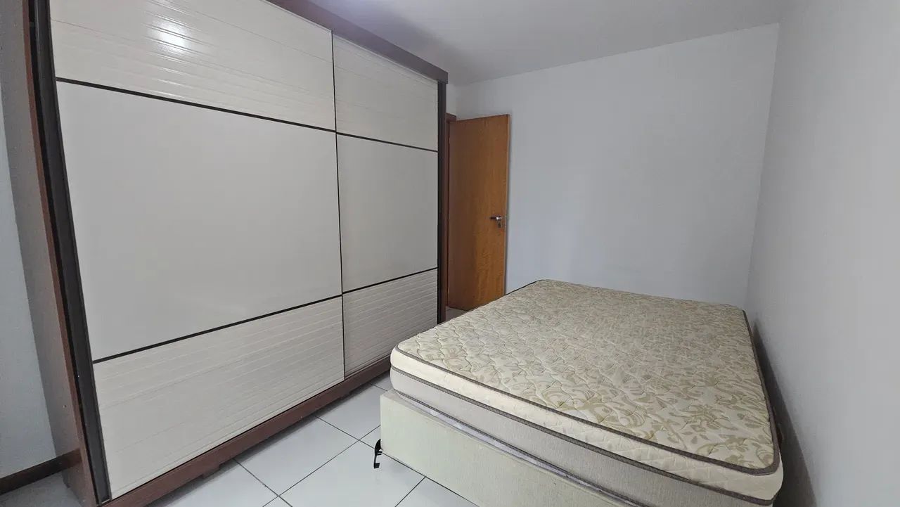 Imóvel mobiliado com dois quartos, varanda com fechamento, split no quarto e bem localizad - Foto 5