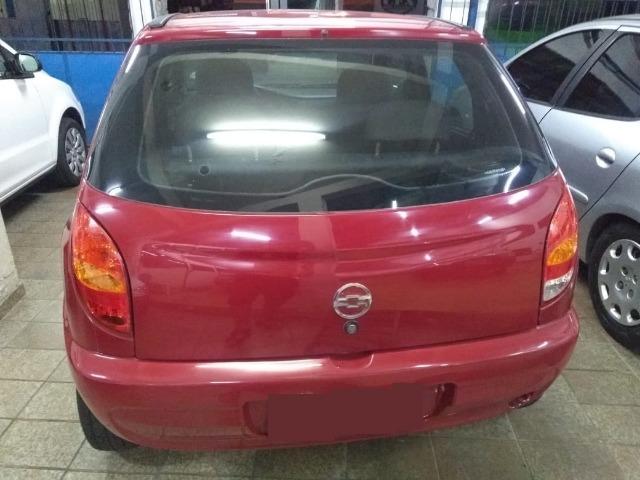Celta Life 1.0 2006 vermelho 4 portas ar condicionado e travas elétricas - Foto 4