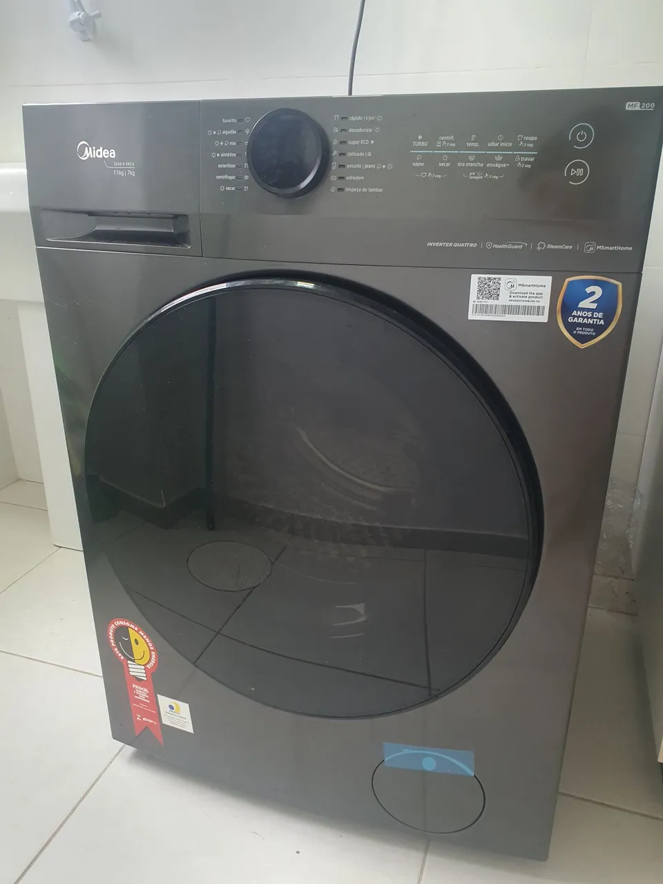 Lava e Seca Midea 11kg HealthGuard, acabamento Titanium, WI-FI.
