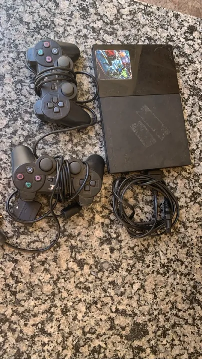 Playstation 2 com jogos