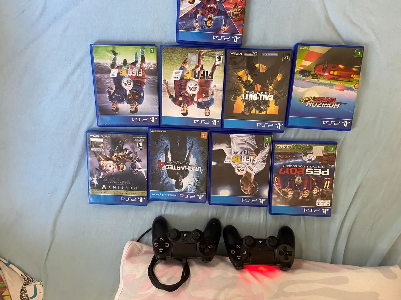 Ps4 modelo fat 500gb 2 controles +9 jogos 