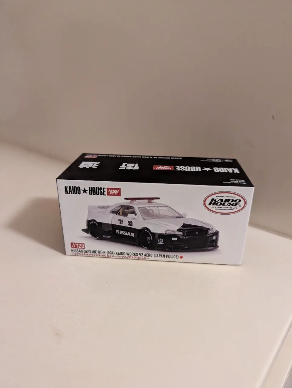 Kaido House X Mini GT GT-R R34 japan police - Brinquedos e Jogos
