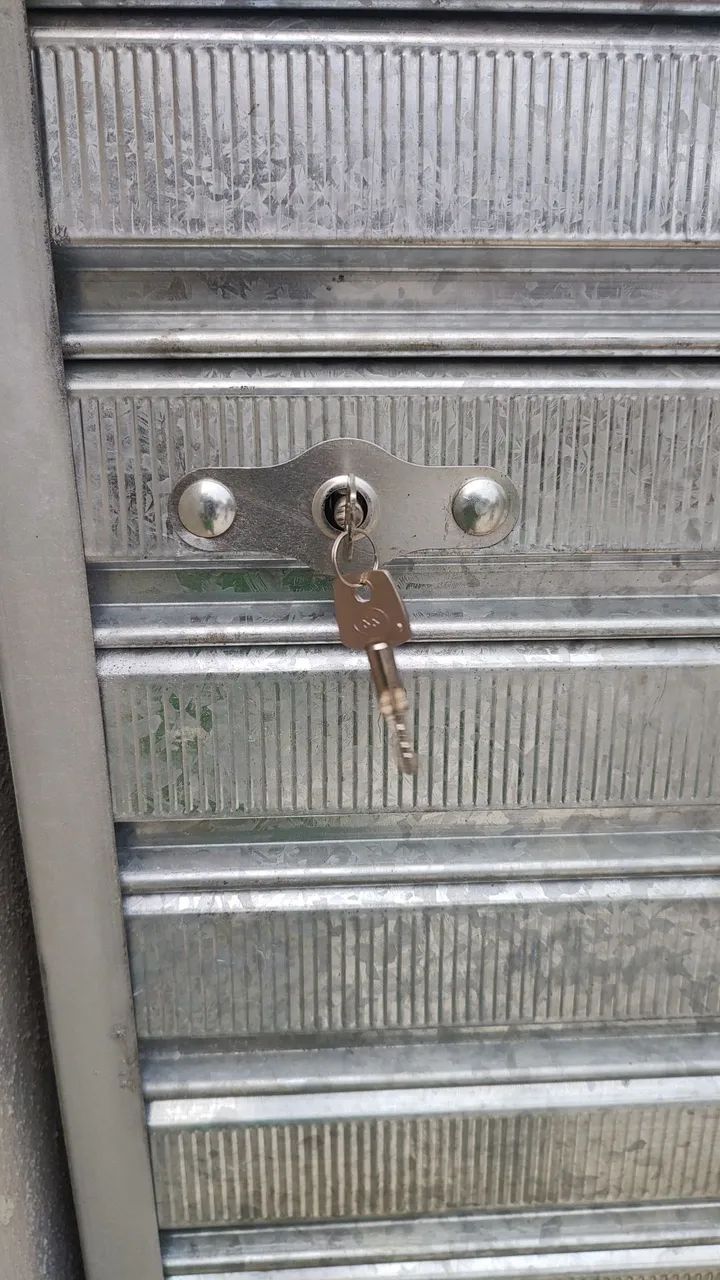 Porta de loja manual 