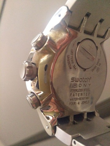 relogio swatch marrom