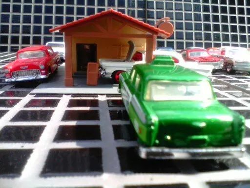 MINIATURA Matchbox 2003 Green Checker Cab Metro Taxi - Escala 1/62. - Foto 3