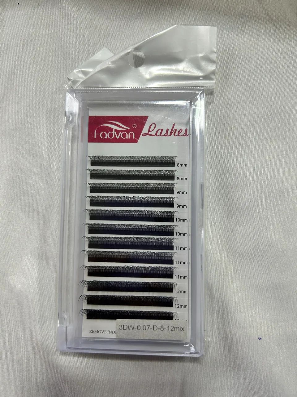 Material para colocação de cílios postiços 