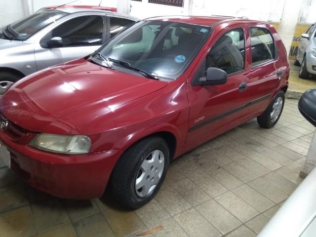 Celta Life 1.0 2006 vermelho 4 portas ar condicionado e travas elétricas - Foto 3