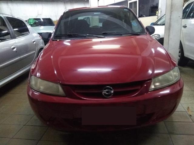 Celta Life 1.0 2006 vermelho 4 portas ar condicionado e travas elétricas