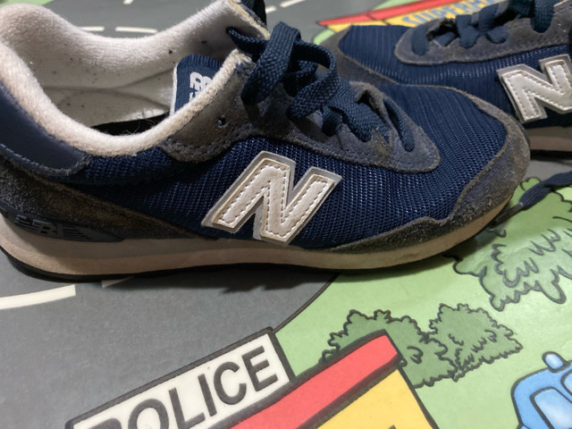 new balance tamanho 33