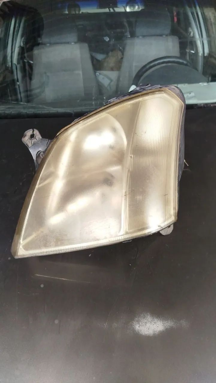 Farol esquerdo Meriva 