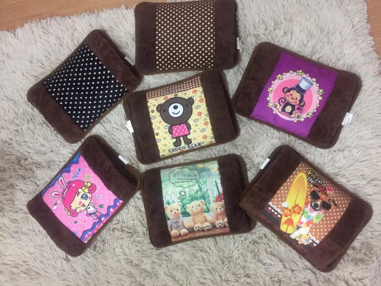 BOLSA ELÉTRICA DE ÁGUA QUENTE - Várias Estampas e Espaço para as Mãos - Foto 3