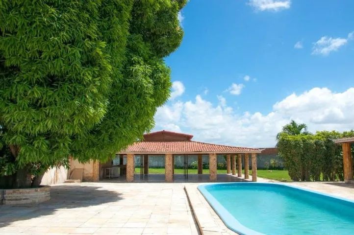 ALUGA-SE Chácara com 10.000m², Casa Mobiliada, Piscinas, Salão e Área de Lazer Completa - Foto 7