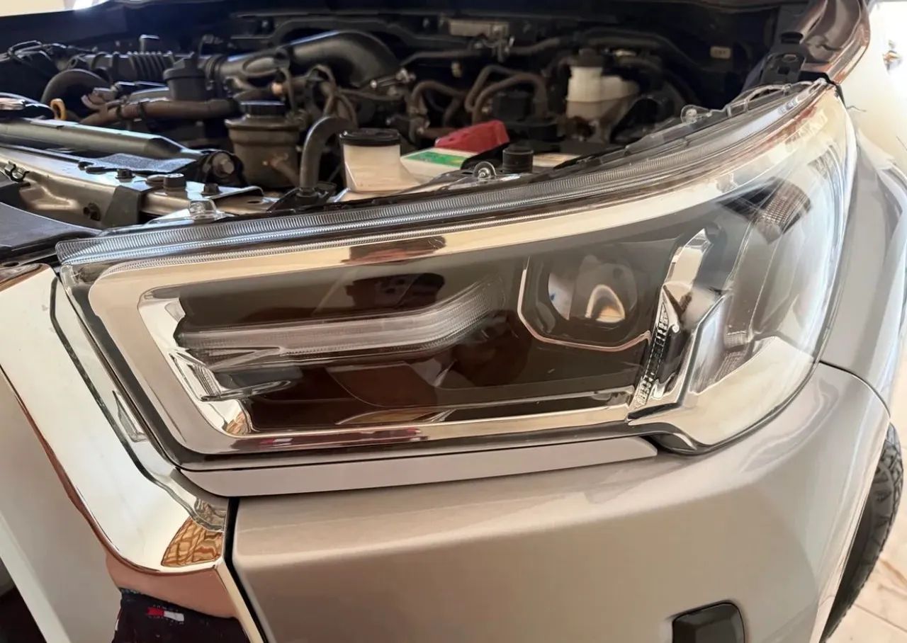 Farol Hilux SRX 21 a 24 