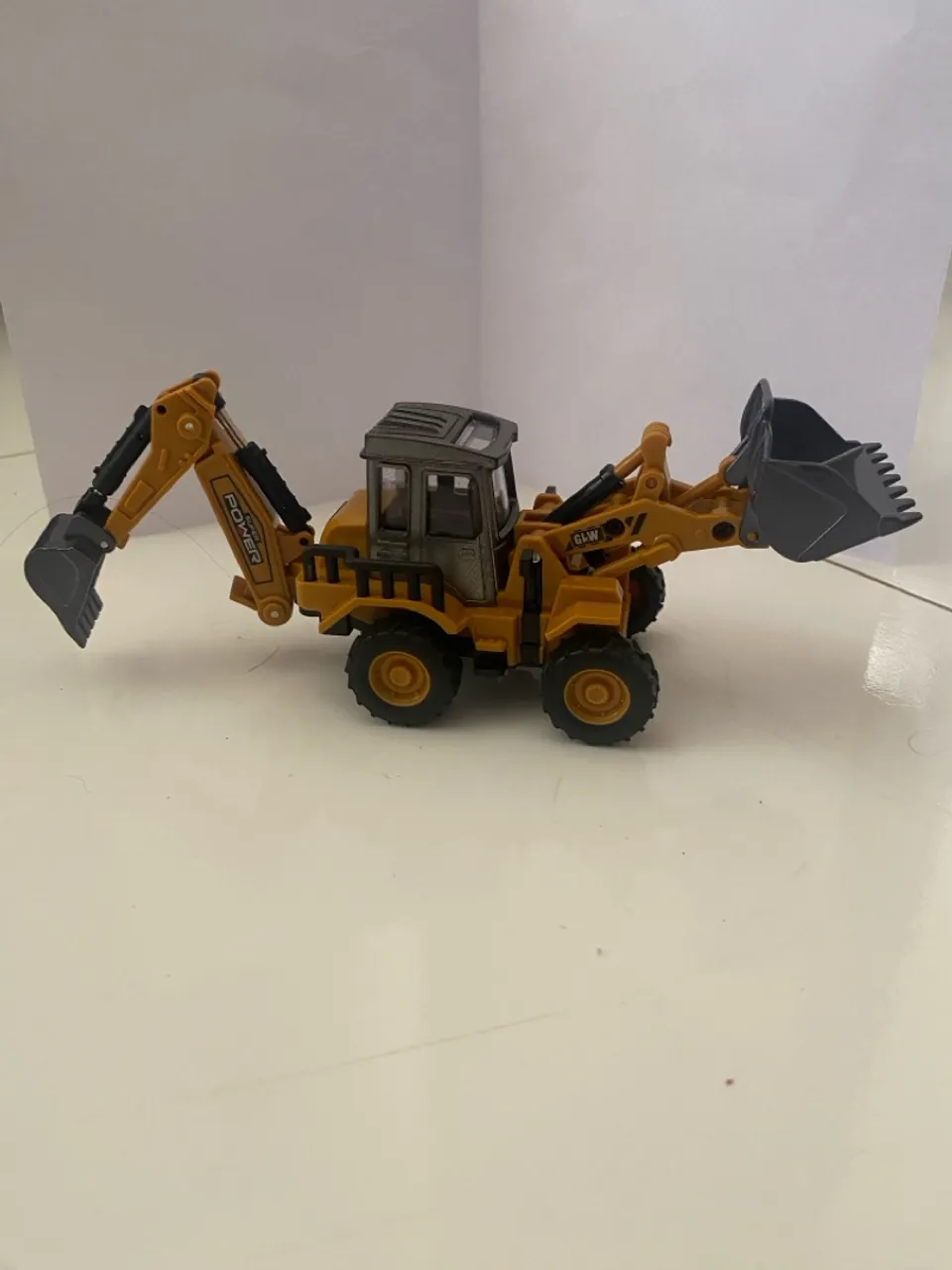 Miniatura de Retroescavadeira Amarela