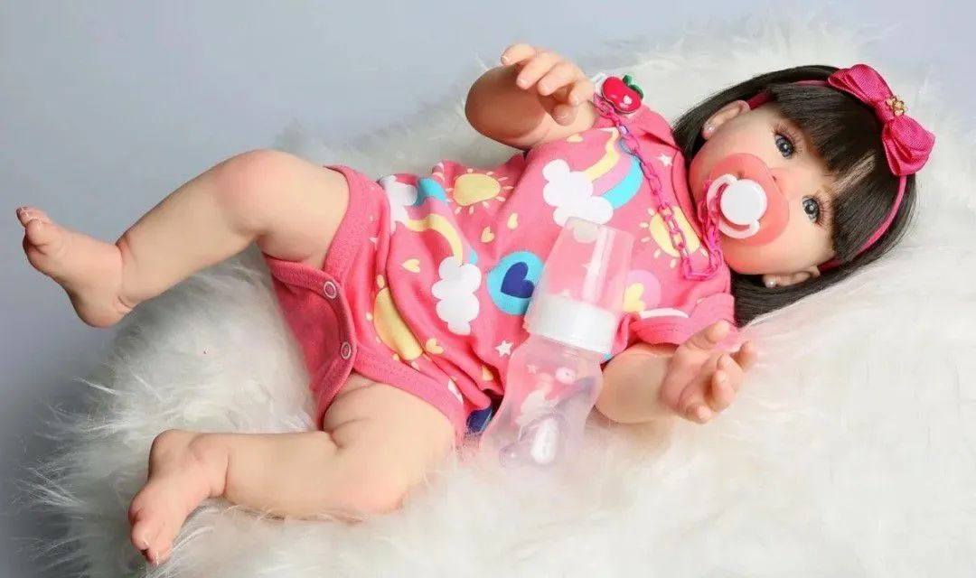 Boneca bebê reborn toda de silicone com cabelo 49 cm - Foto 3