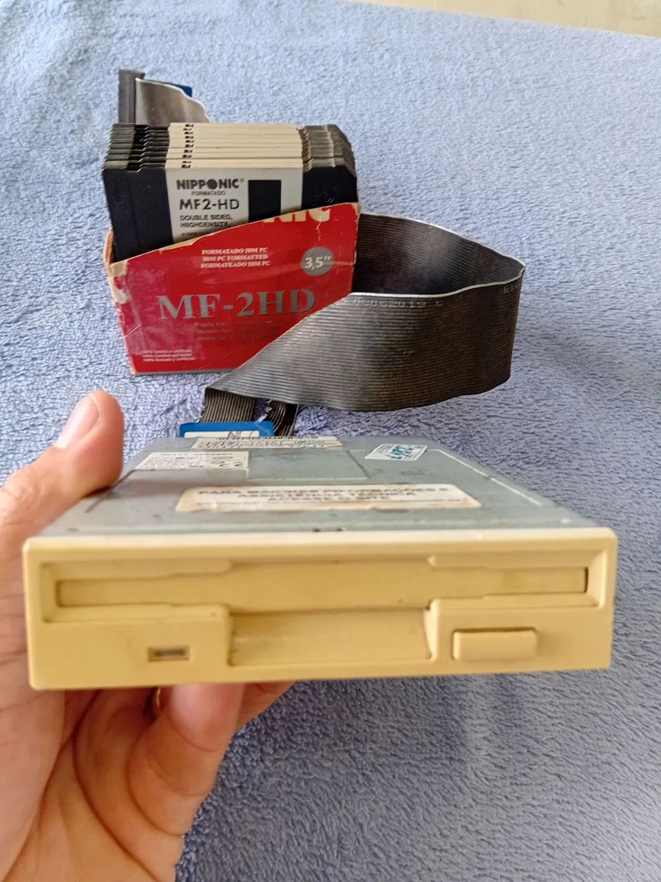 Drive de disquete + caixa com disquetes