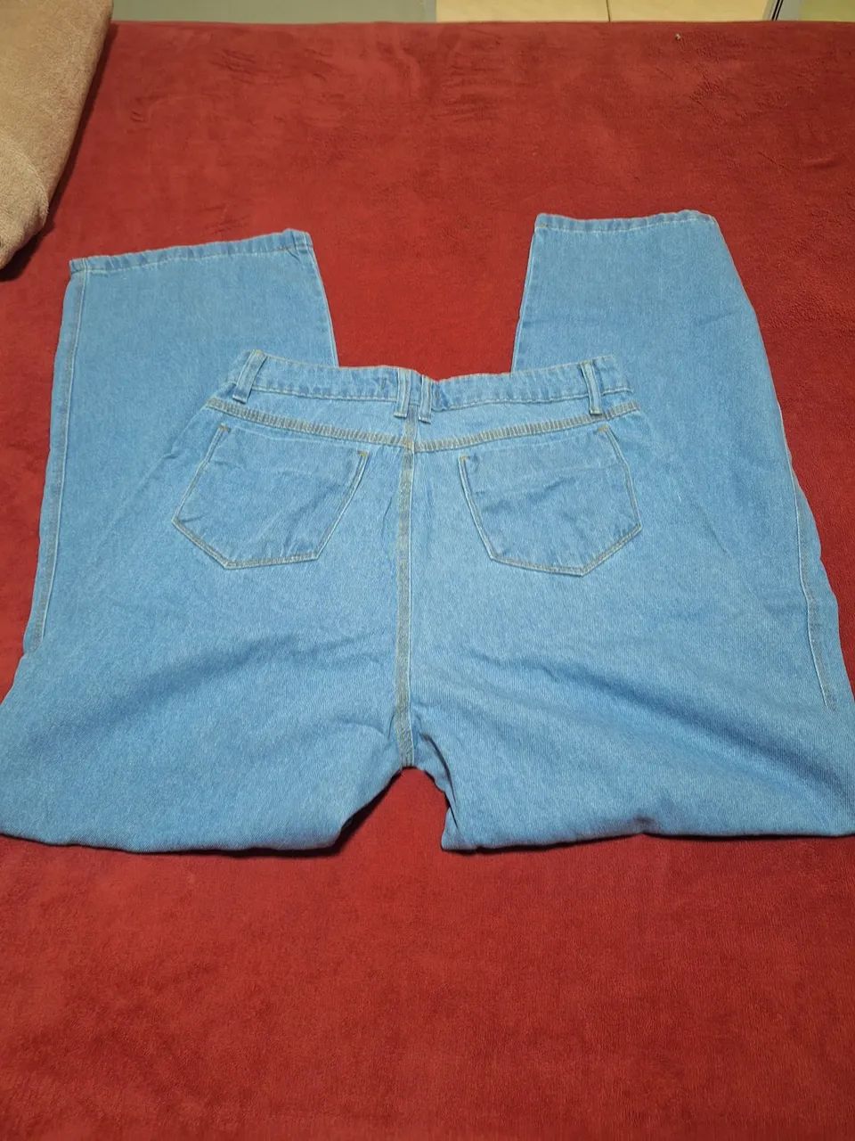 Calça jeans tam 44 nunca usada - Foto 2