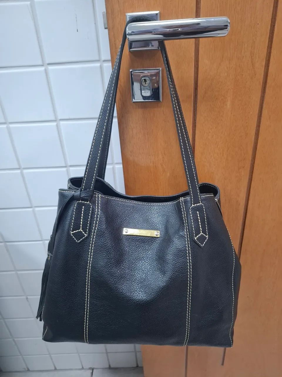 Bolsa de Couro Legítimo.