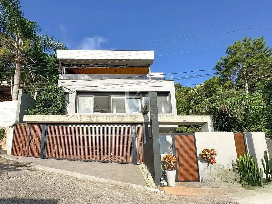 Casa com 3 suítes e vista mar em condomínio no Cacupé/SC - Foto 2