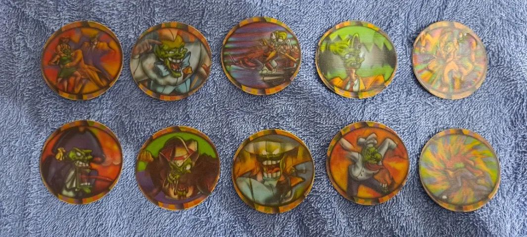 LOTE 1 - COM 10 GIGAN TAZOS O MÁSKARA BRONZE - ELMA CHIPS - NÚMEROS 41 A 50 - Foto 3