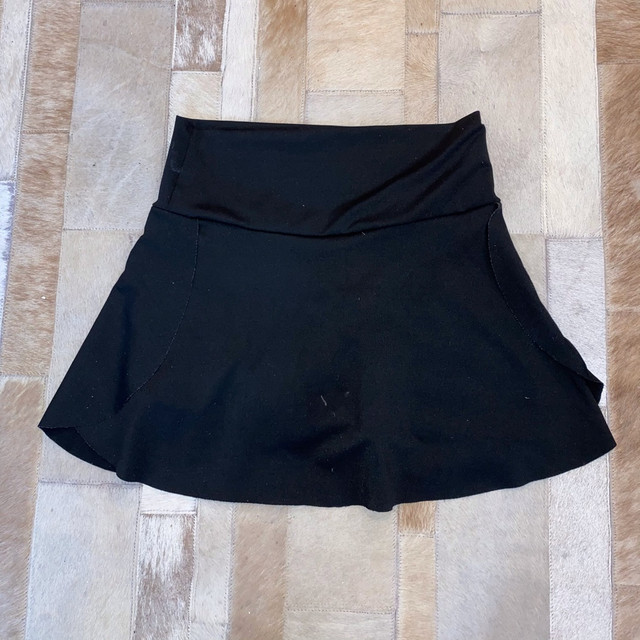 short saia de academia preto