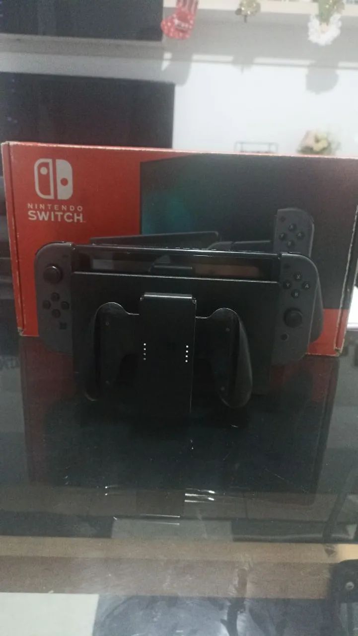 Nintendo switch V2 with 5 games with the box64315488029826120