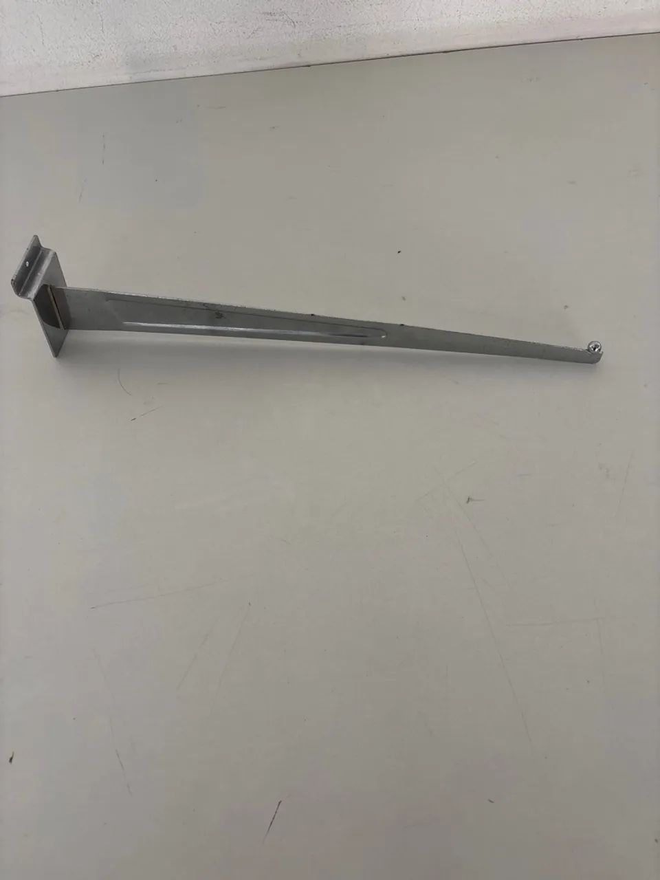 Mão francesa para painel canaletado cromada