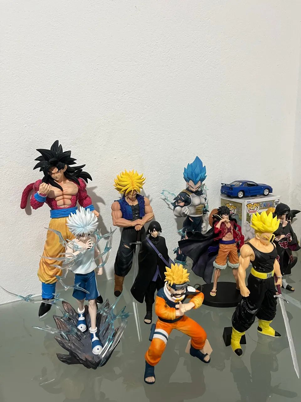 Action figures, funkos, bonsais e outros
