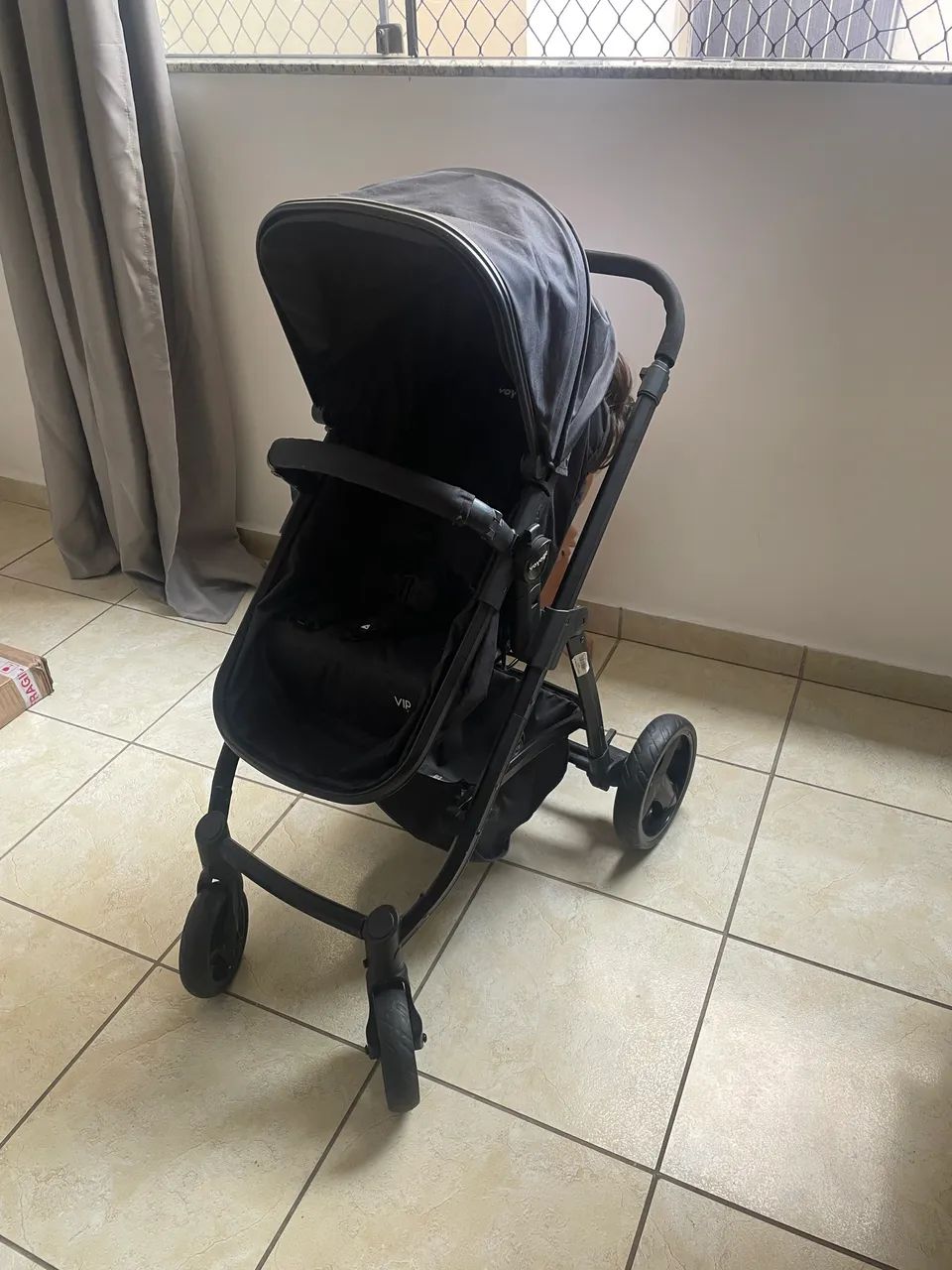 Carrinho de bebê com bebê conforto e Moisés 