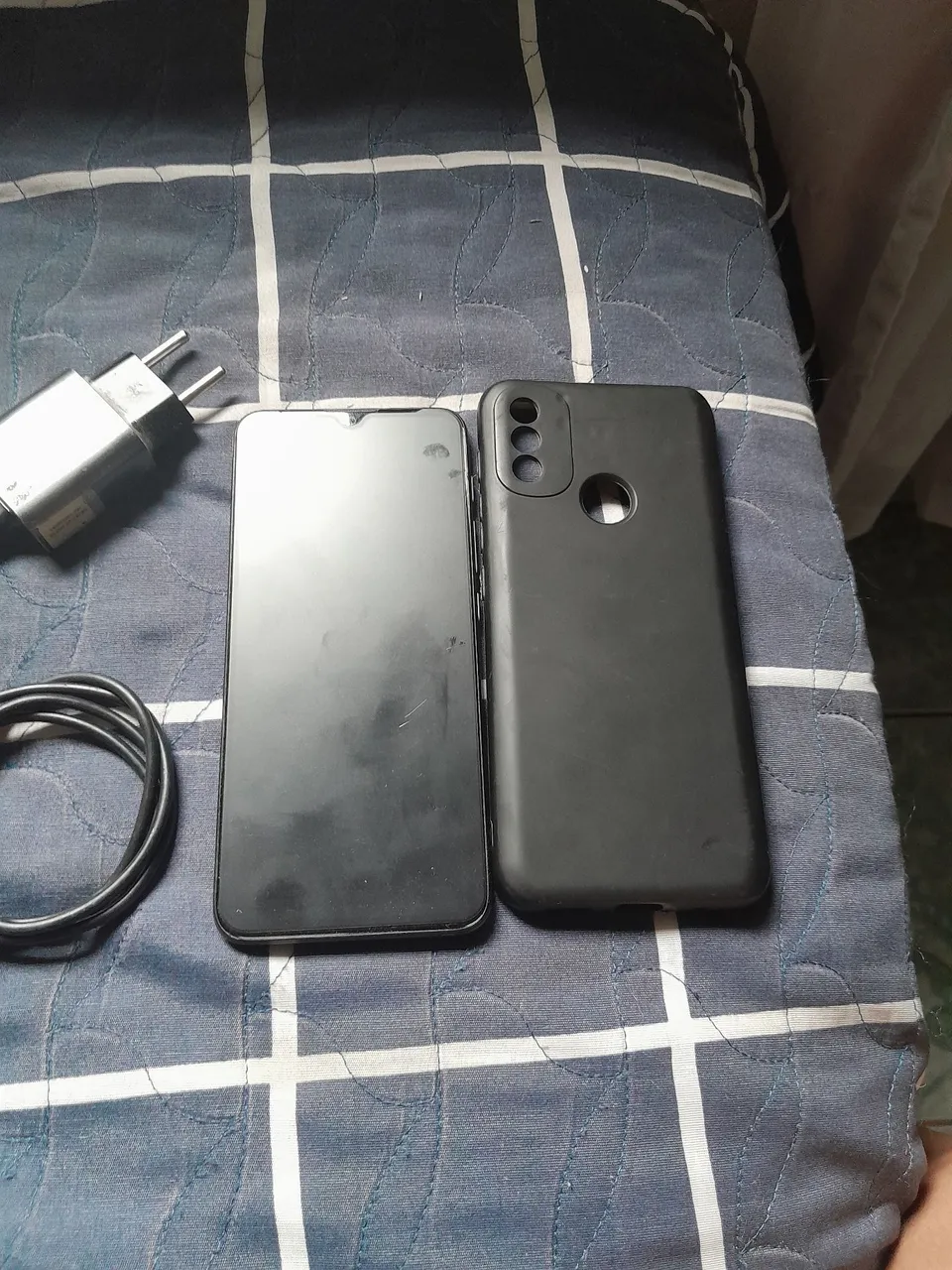 Celular Motorola 64 Gb,3 de ranking,em perfeito estado, vai com película 3d,e um capinha p