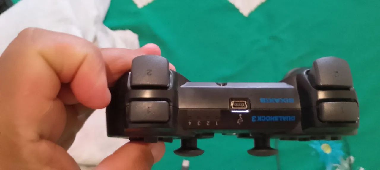 Vendo joystick e jogo de PlayStation 3 - Foto 2