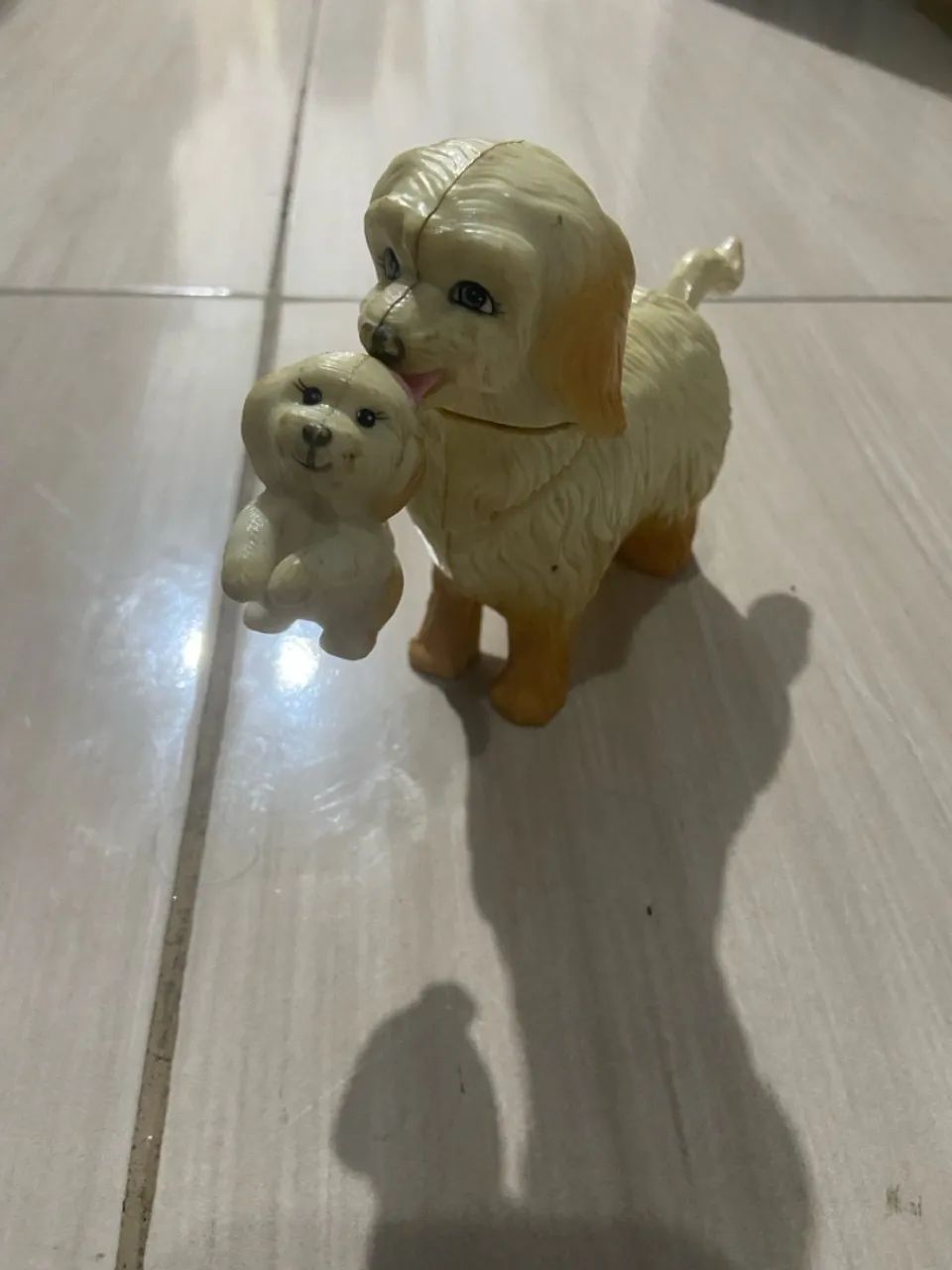 Cachorrinho com filhote da Barbie