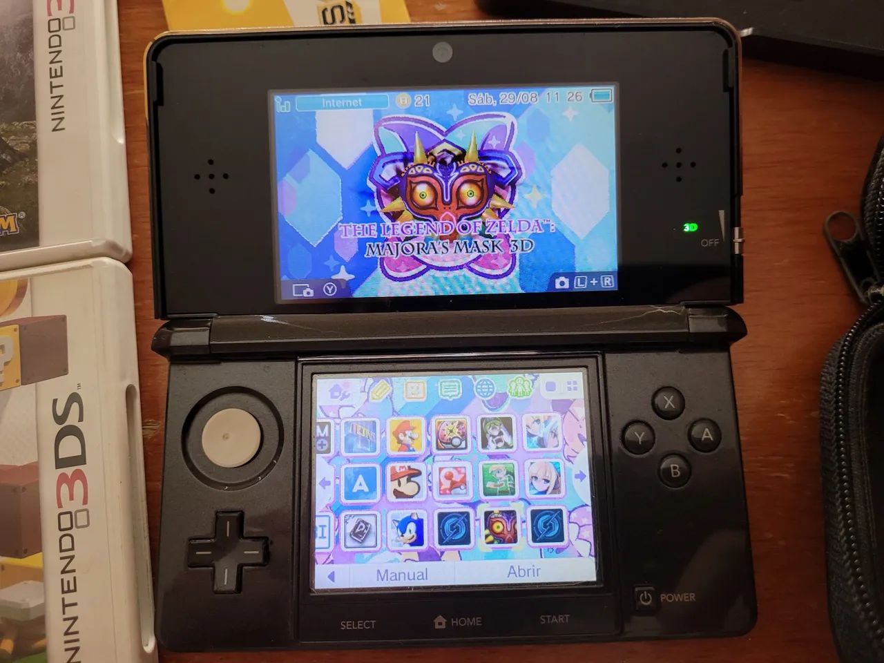 Nintendo 3DS + 4 jogos - Foto 5