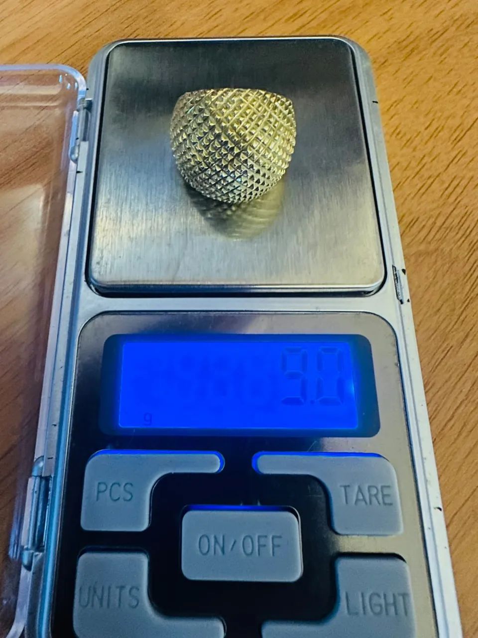 Anel ouro maciço 18k com 9 gramas