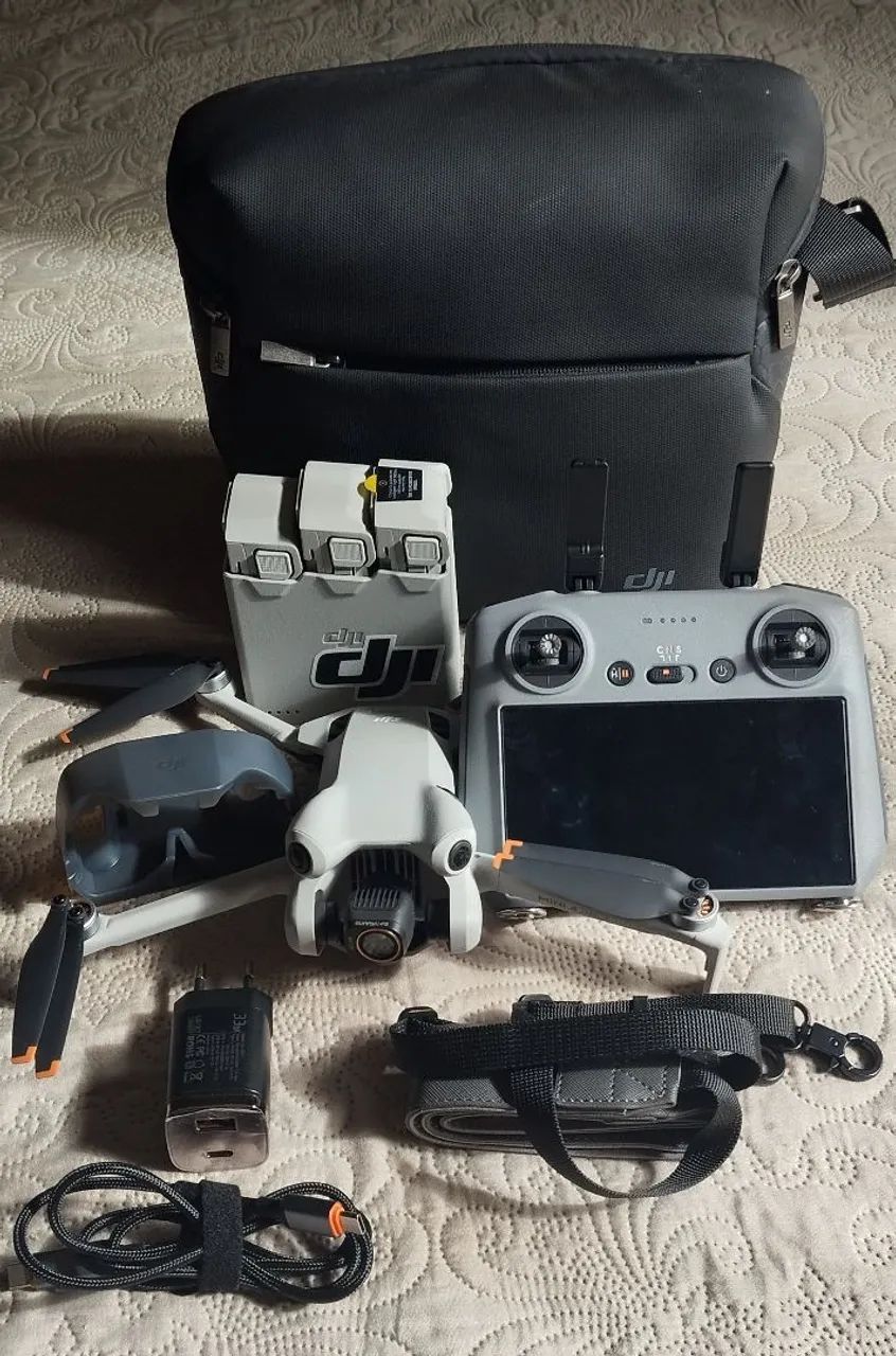 Drone DJI Mini 4 Pro - Novo na Caixa (Vai com 2 cartões de memória  e vários acessórios). - Foto 2