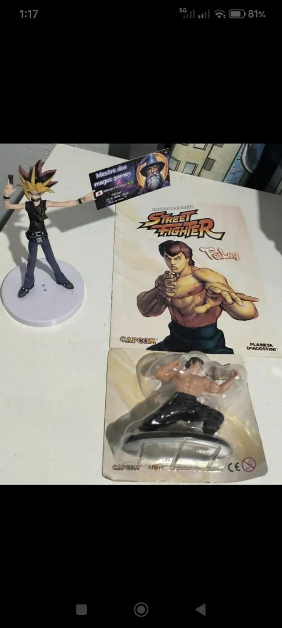 Action figure feilong com fascículo 