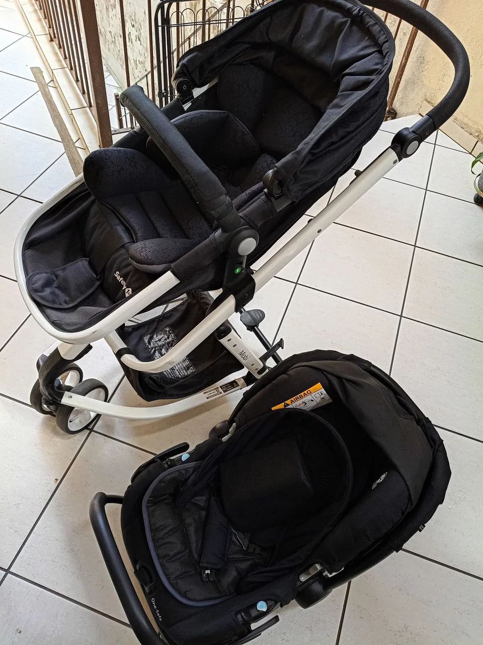 Carrinho de bebê com bebê conforto conjunto 